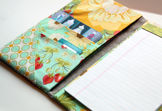 Fabric Portfolio and Notepad holder. SO easy and a great way to add style to your accessories! From The Cottage Mama.